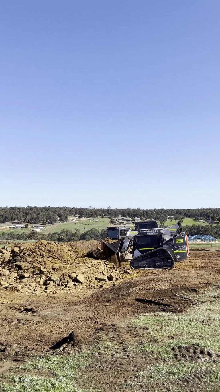 Wide view of a levelled and stripped site ready for construction